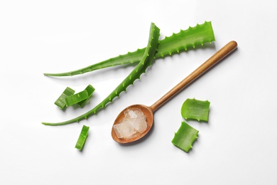 Flat lay composition with aloe vera on white background