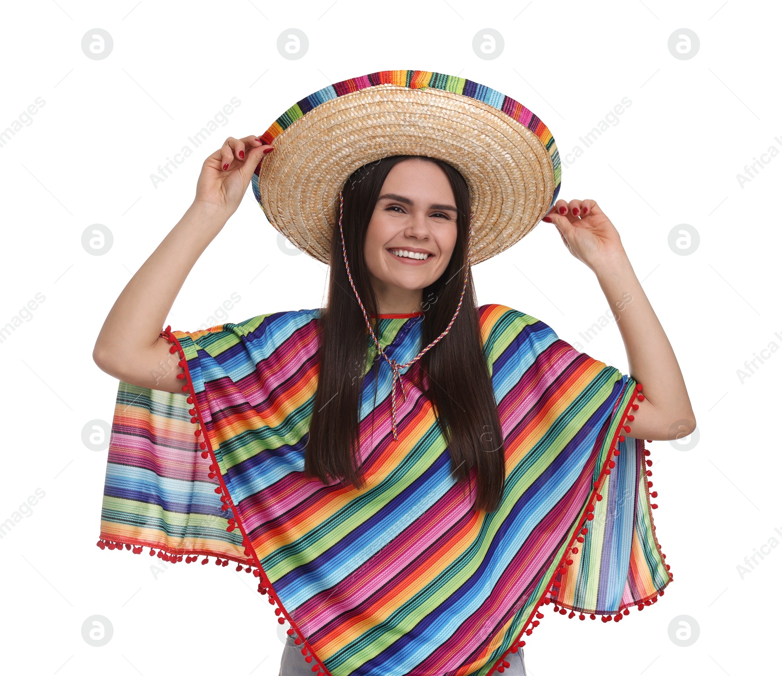 Photo of Young woman in Mexican sombrero hat and poncho on white background