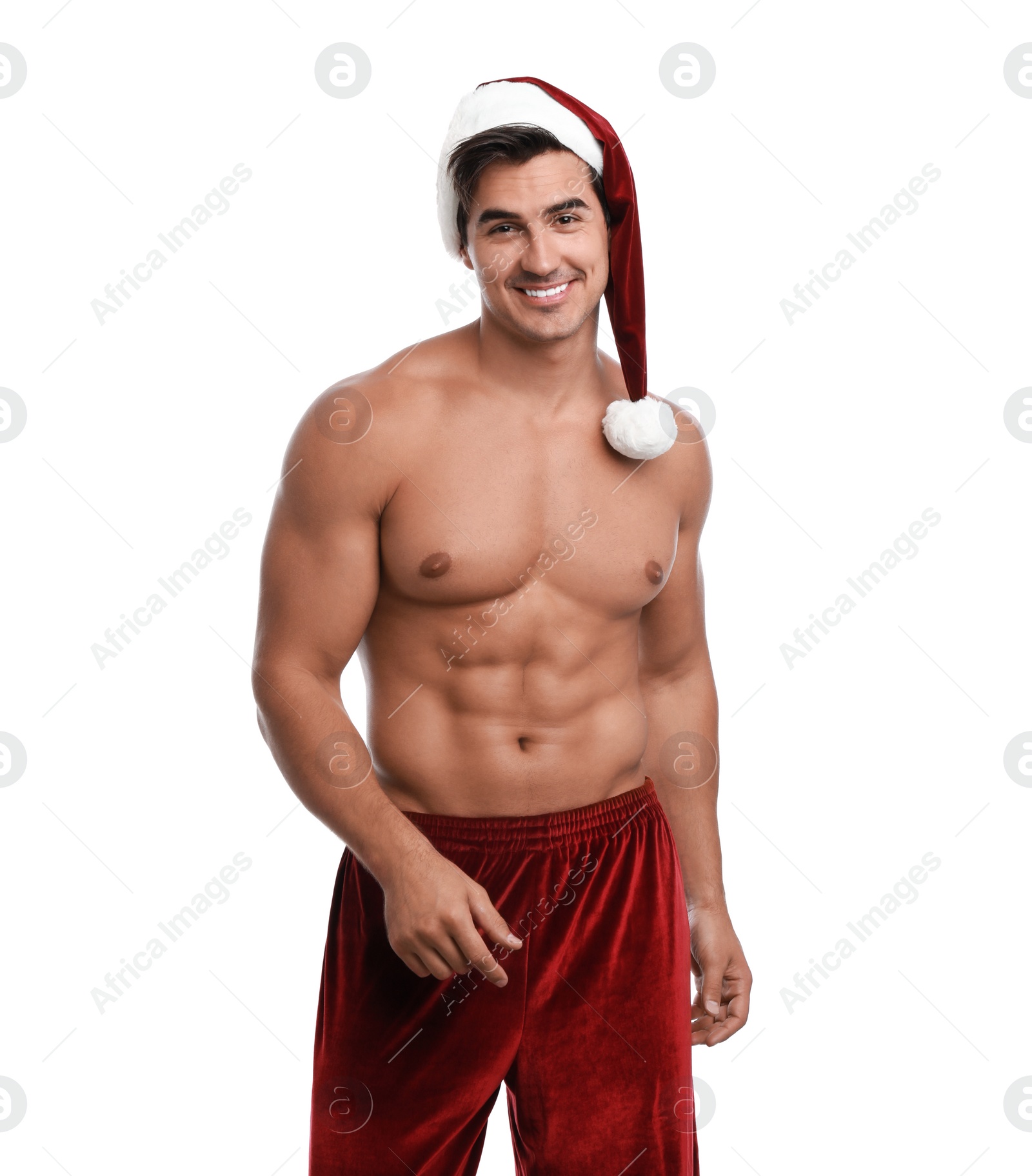 Photo of Sexy shirtless Santa Claus on white background