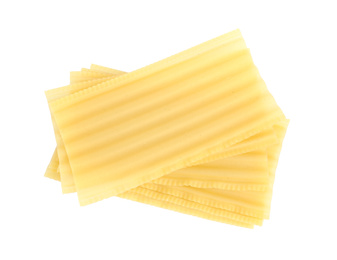 Photo of Stack of uncooked lasagna sheets isolated on white, top view