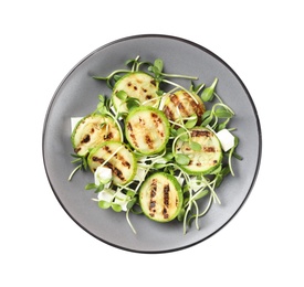 Photo of Delicious salad with grilled zucchini slices and feta cheese on white background, top view