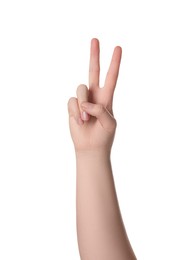 Photo of Playing rock, paper and scissors. Woman making scissors with her fingers on white background, closeup