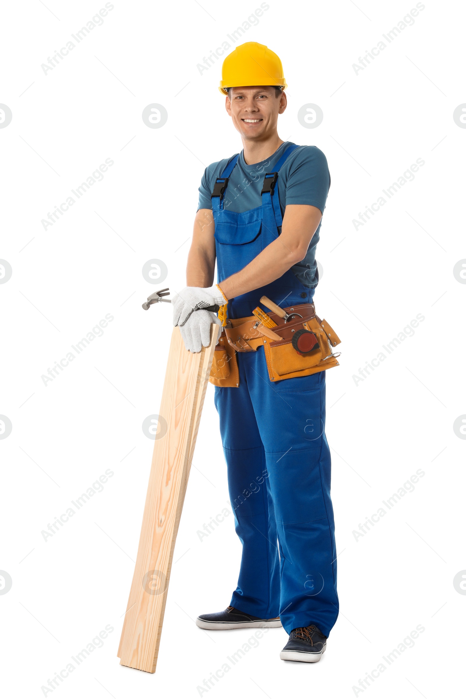 Photo of Handsome carpenter with wooden planks isolated on white