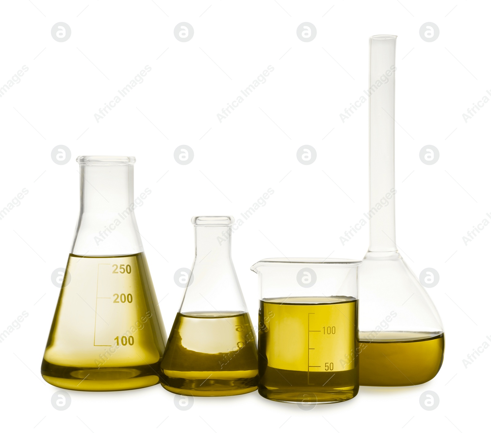 Image of Laboratory glassware with yellow liquid isolated on white