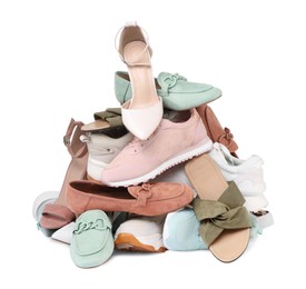 Photo of Pile of different female shoes isolated on white