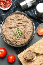 Photo of Flat lay composition with tasty liver pate on black table