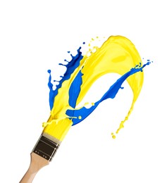 Image of Brush with splashing yellow and blue paints on white background
