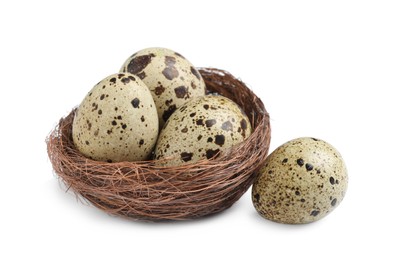 Photo of Nest with quail eggs on white background