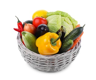 Photo of Wicker basket with fresh ripe vegetables and fruit on white background