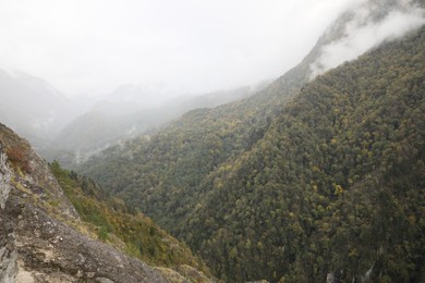 Picturesque view of mountains on autumn day outdoors