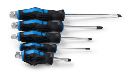 Photo of Set of screwdrivers with blue handles isolated on white