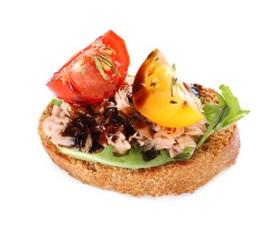 Delicious bruschetta with balsamic vinegar, tomato, arugula and tuna isolated on white