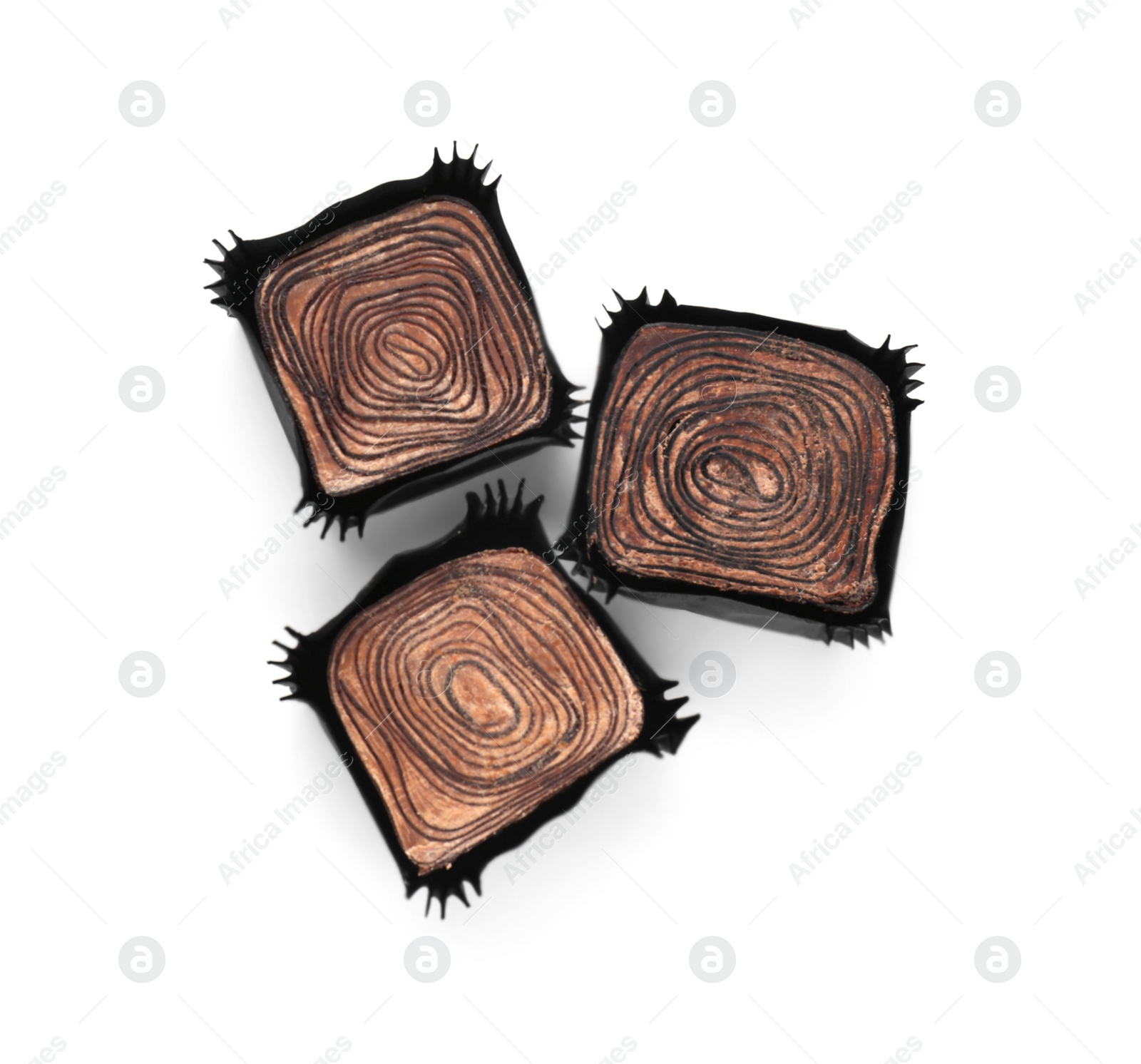 Photo of Tasty chocolate candies isolated on white, top view