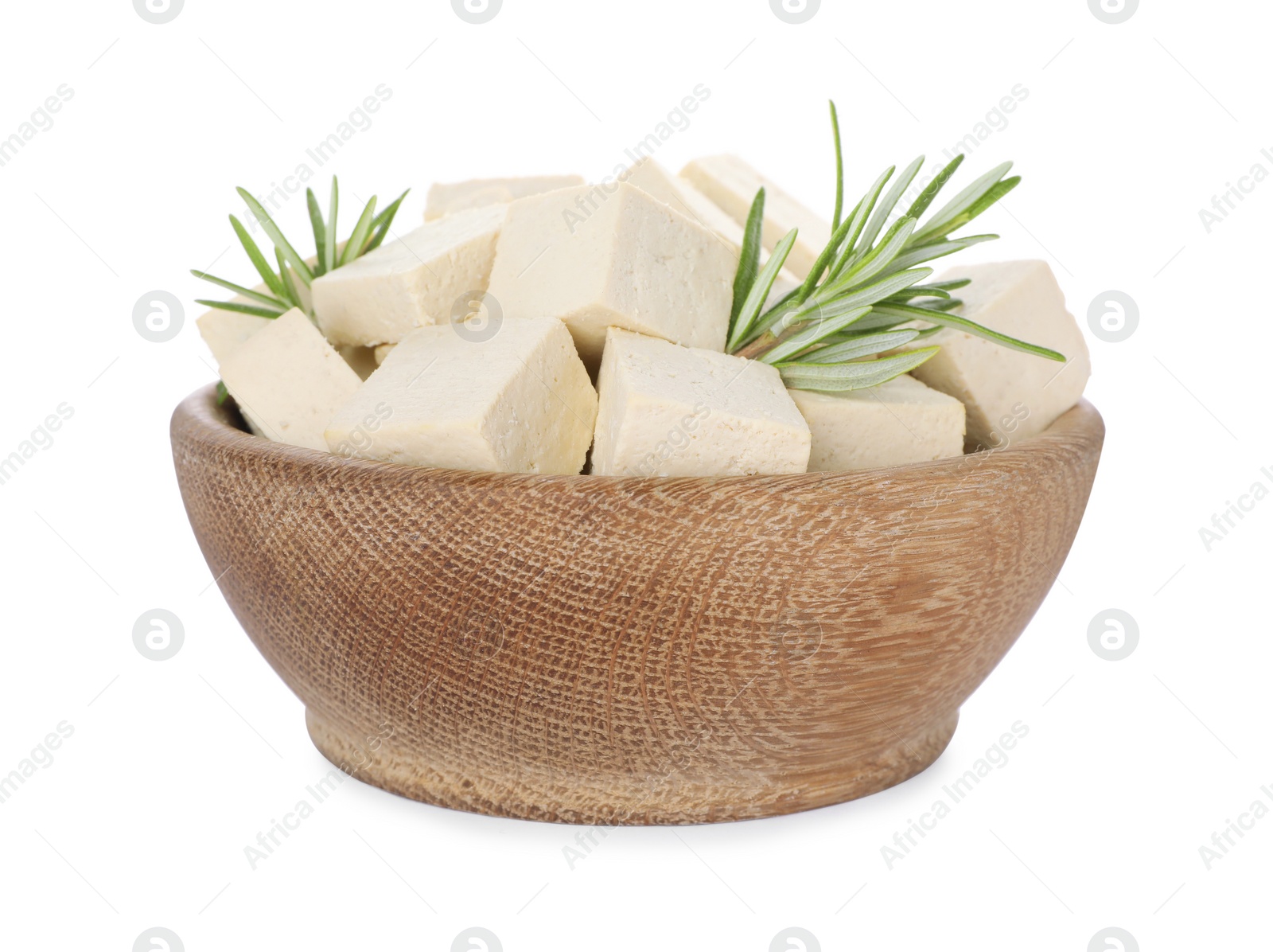 Photo of Wooden bowl with delicious tofu and rosemary isolated on white