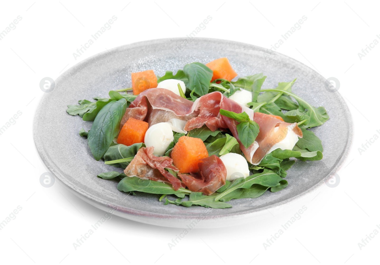 Photo of Fresh melon with prosciutto, mozzarella and arugula on white background