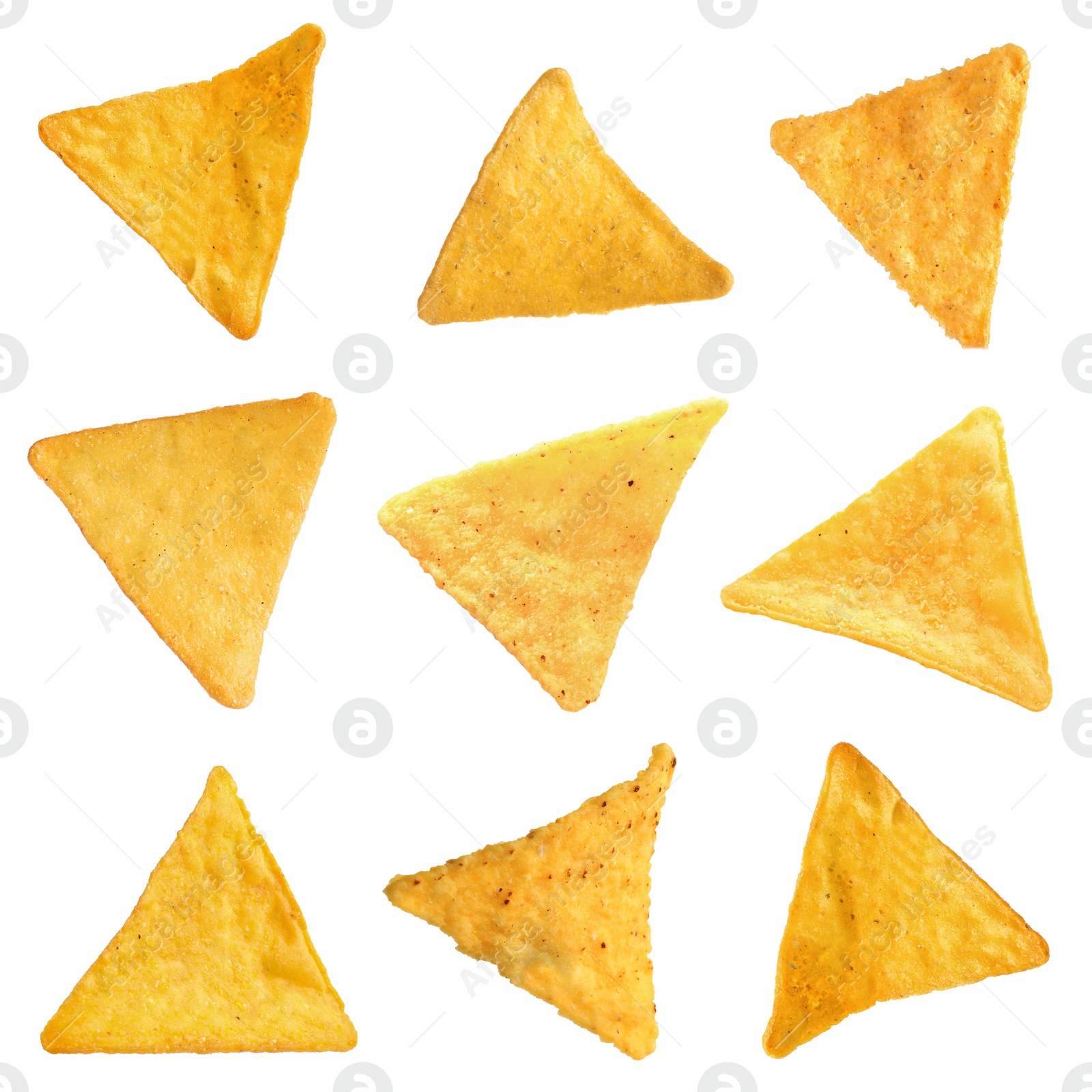 Image of Set with tasty tortilla chips (nachos) on white background