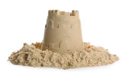 Pile of sand with castle on white background. Outdoor play