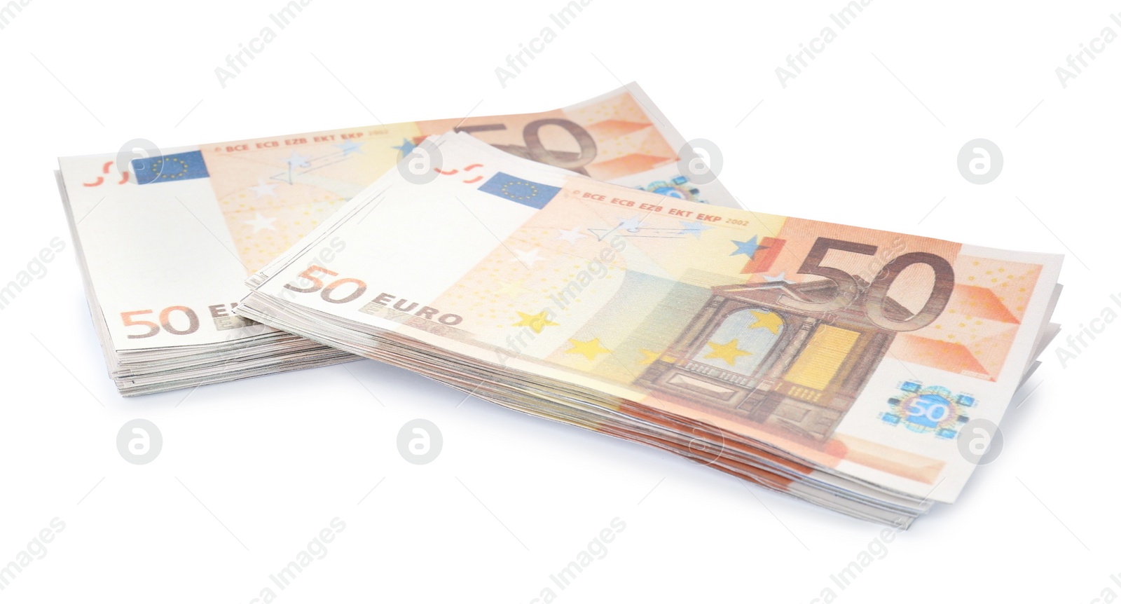 Photo of Stacks of euro banknotes isolated on white. Money and finance