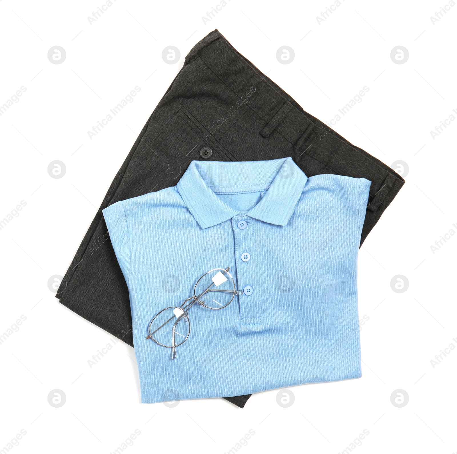 Photo of School uniform for boy on white background, top view