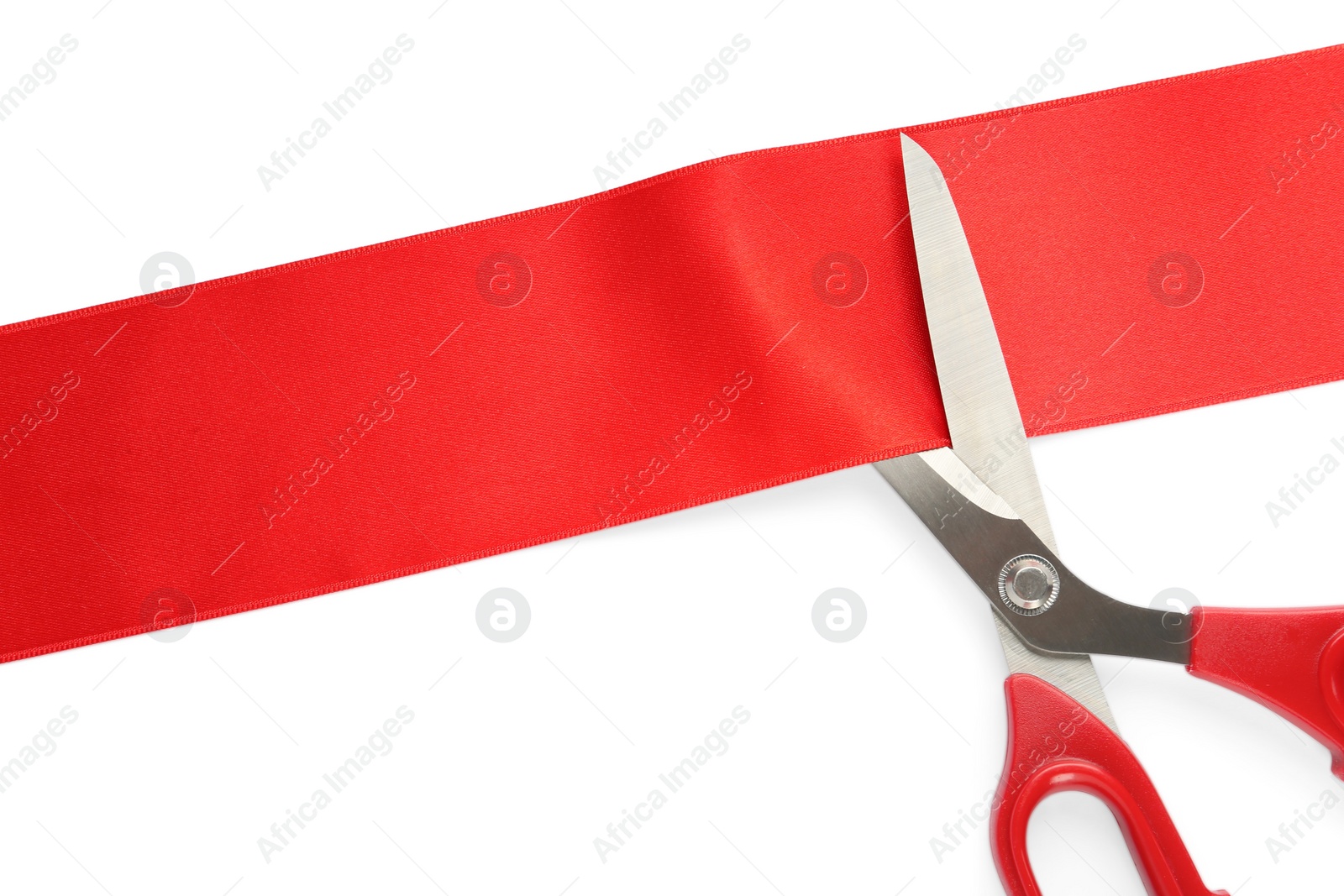 Photo of Ribbon and scissors on white background, top view