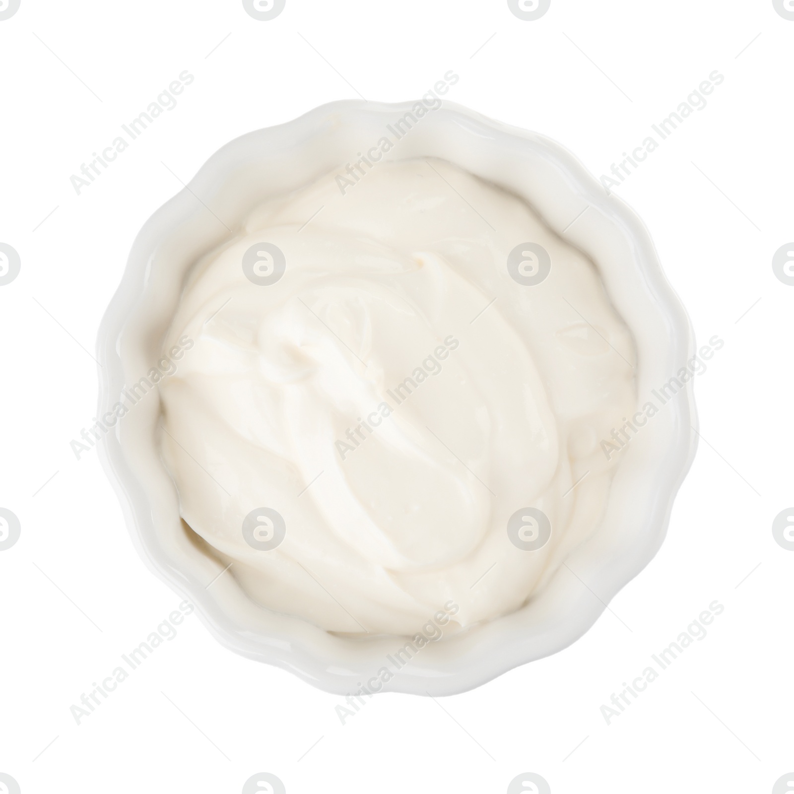 Photo of Bowl with sour cream on white background, top view