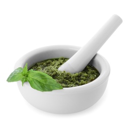 Photo of Mortar of tasty pesto sauce with basil leaves and pestle isolated on white