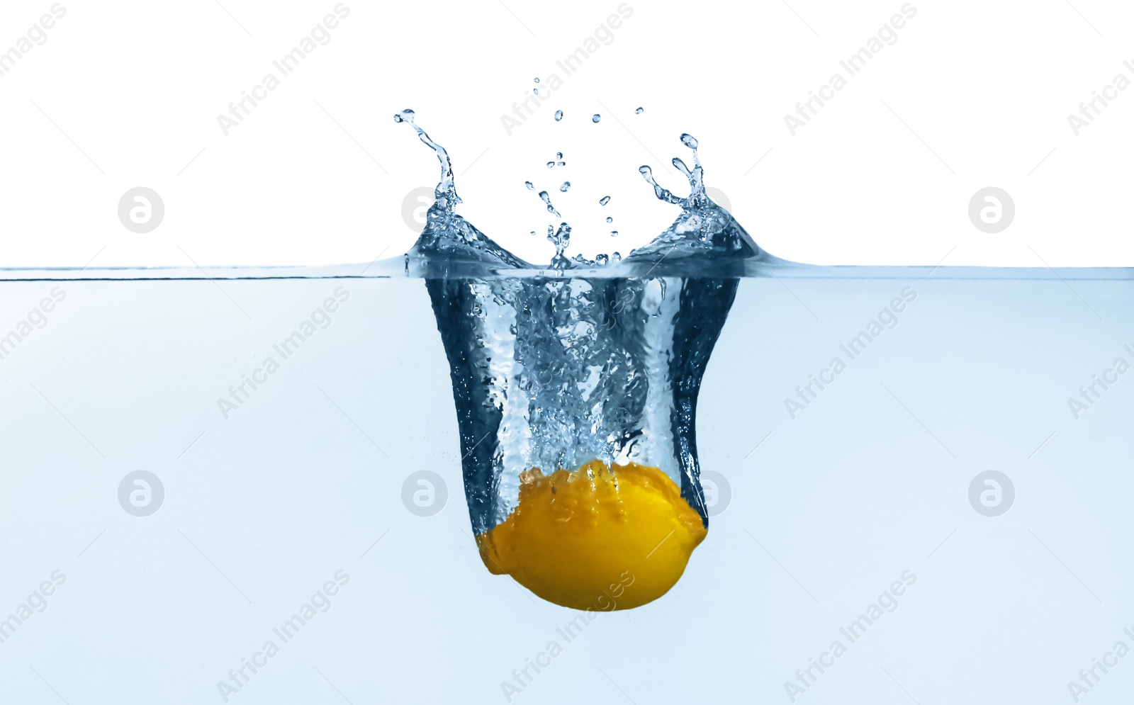 Photo of Ripe lemon falling down into clear water with splashes against white background