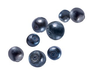 Image of Fresh ripe bilberries flying on white background