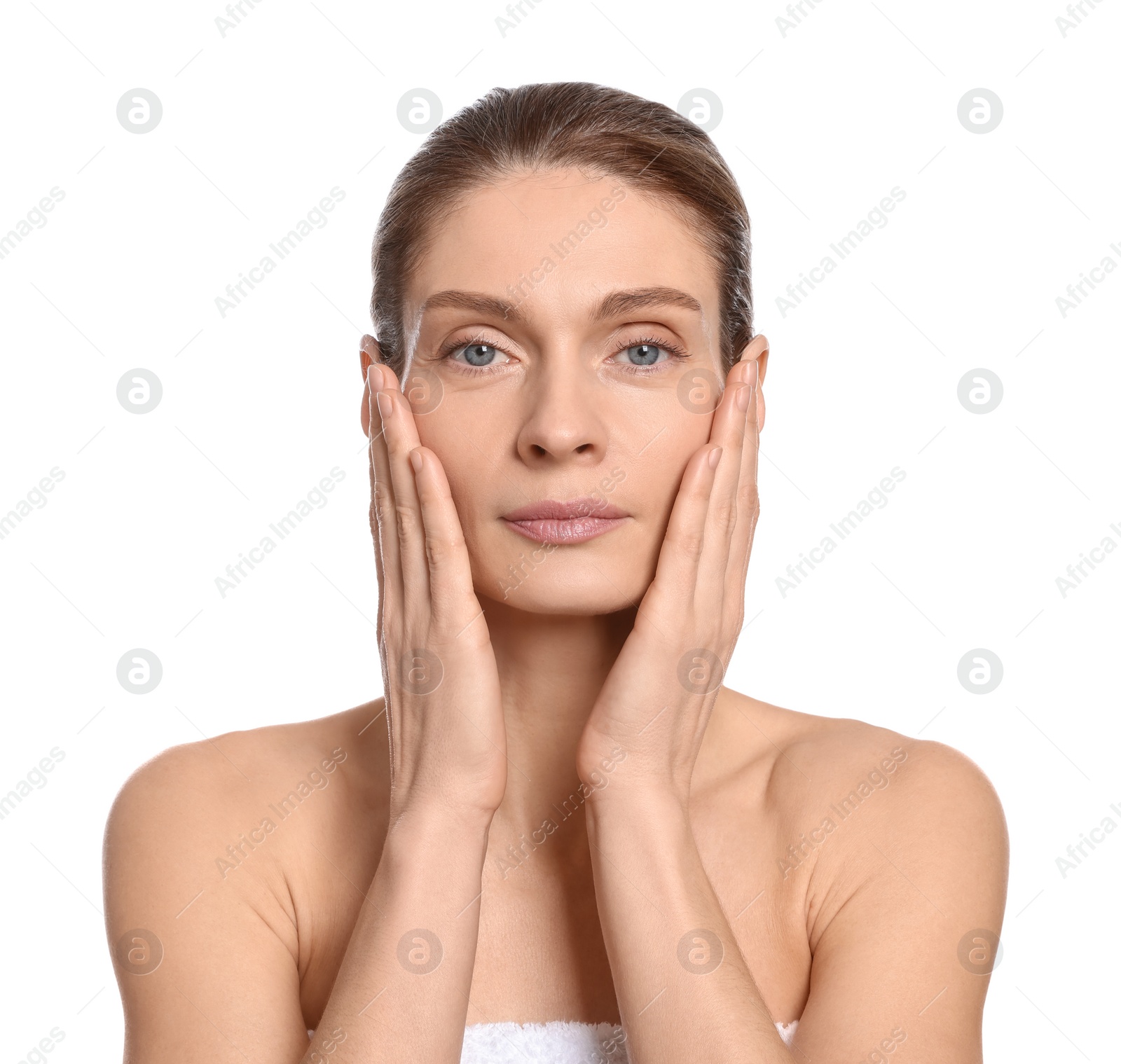 Photo of Woman massaging her face on white background