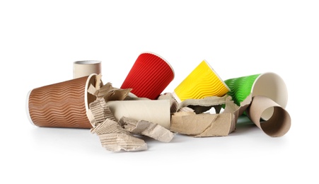 Photo of Pile of cardboard garbage on white background. Recycling problem