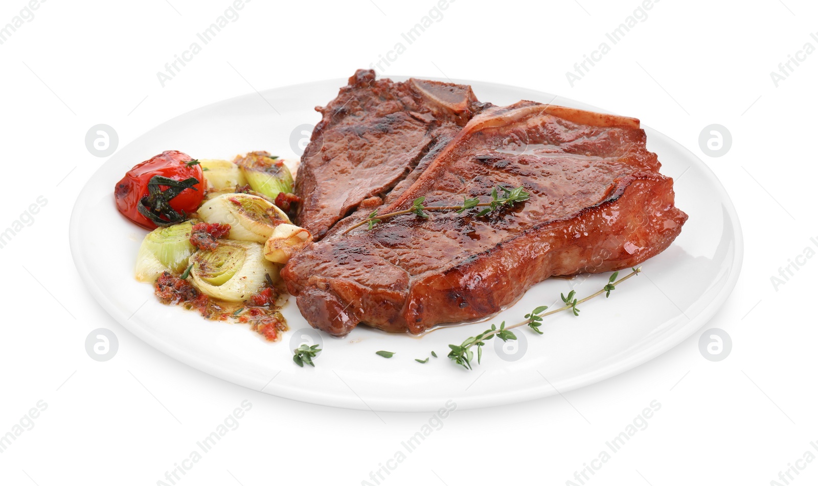 Photo of Delicious fried beef meat and vegetables isolated on white