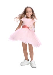 Cute little girl in beautiful dress dancing on white background