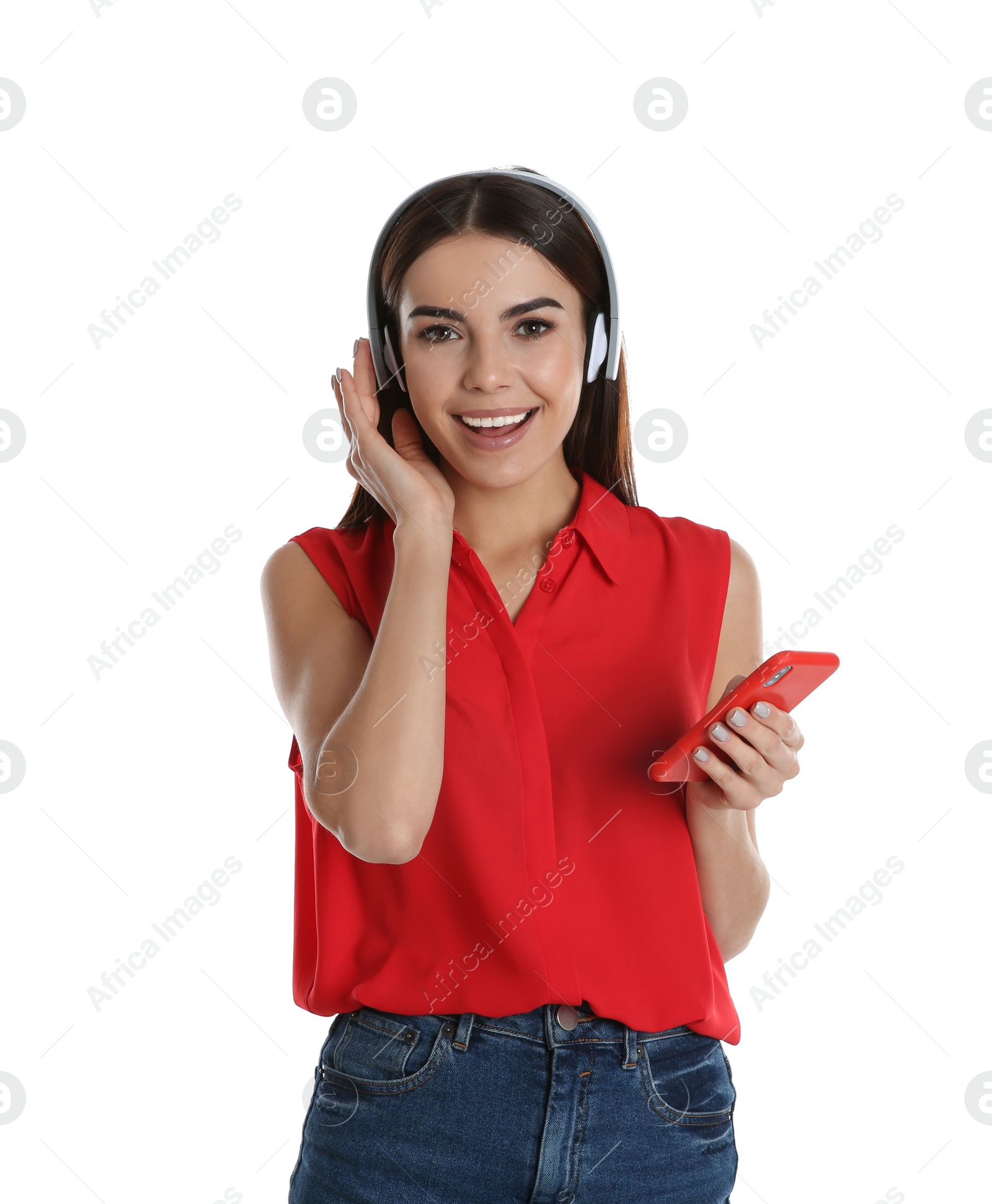 Photo of Beautiful young woman listening to music with headphones on white background