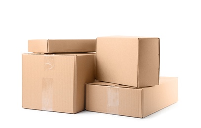 Photo of Pile of cardboard boxes on white background