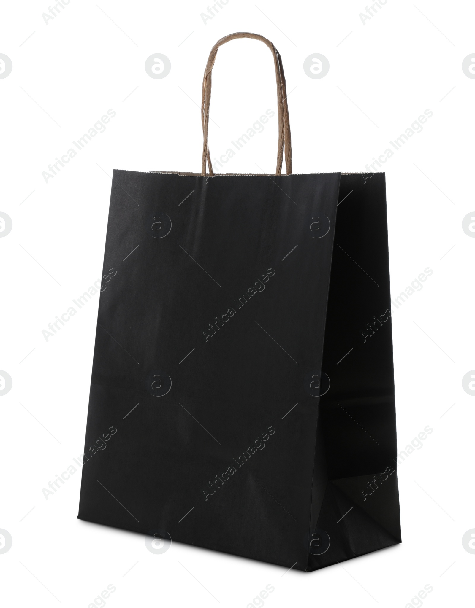 Photo of Blank black paper bag on white background. Space for design