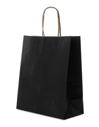 Blank black paper bag on white background. Space for design