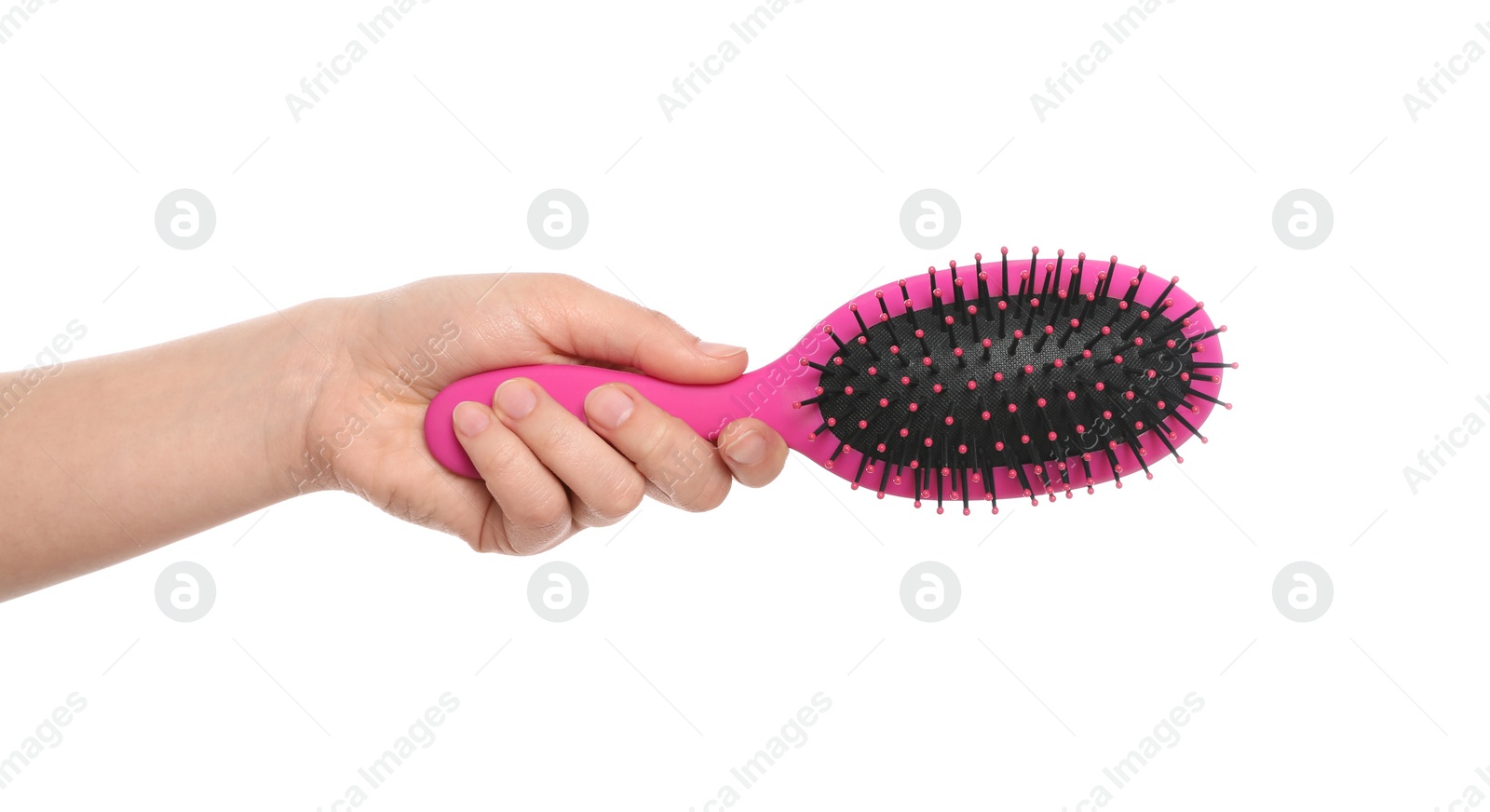 Photo of Woman holding hair brush on white background, closeup