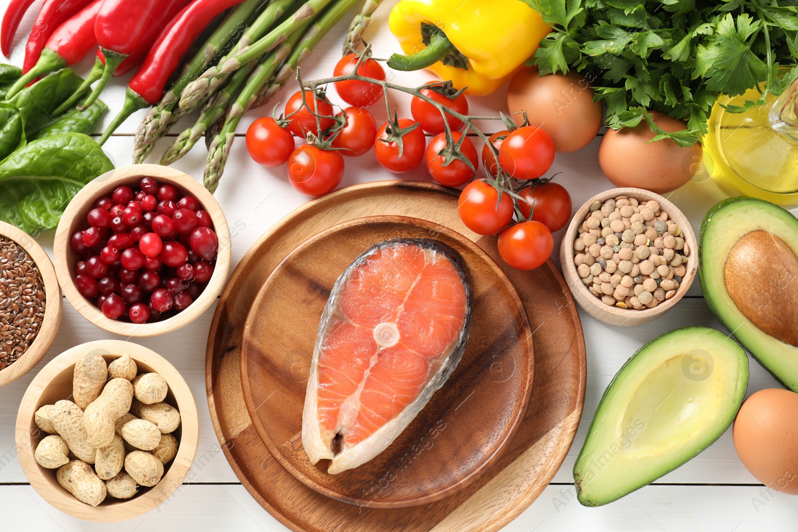 Photo of Many different healthy food on white wooden table, flat lay