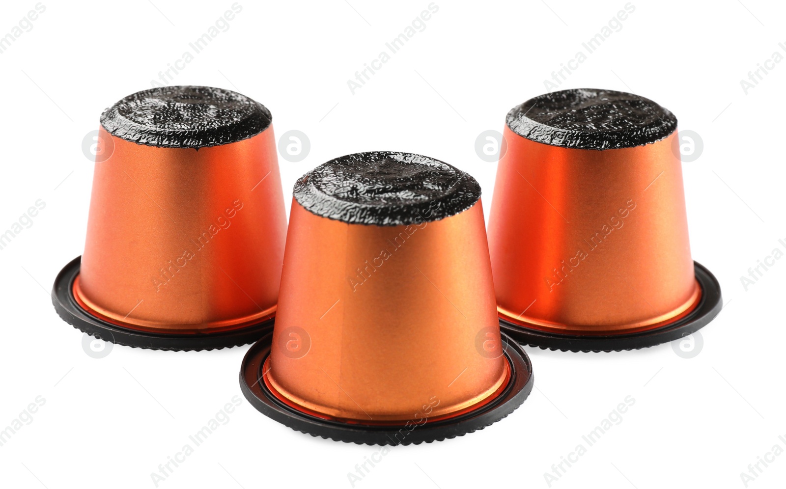 Photo of Three plastic coffee capsules isolated on white