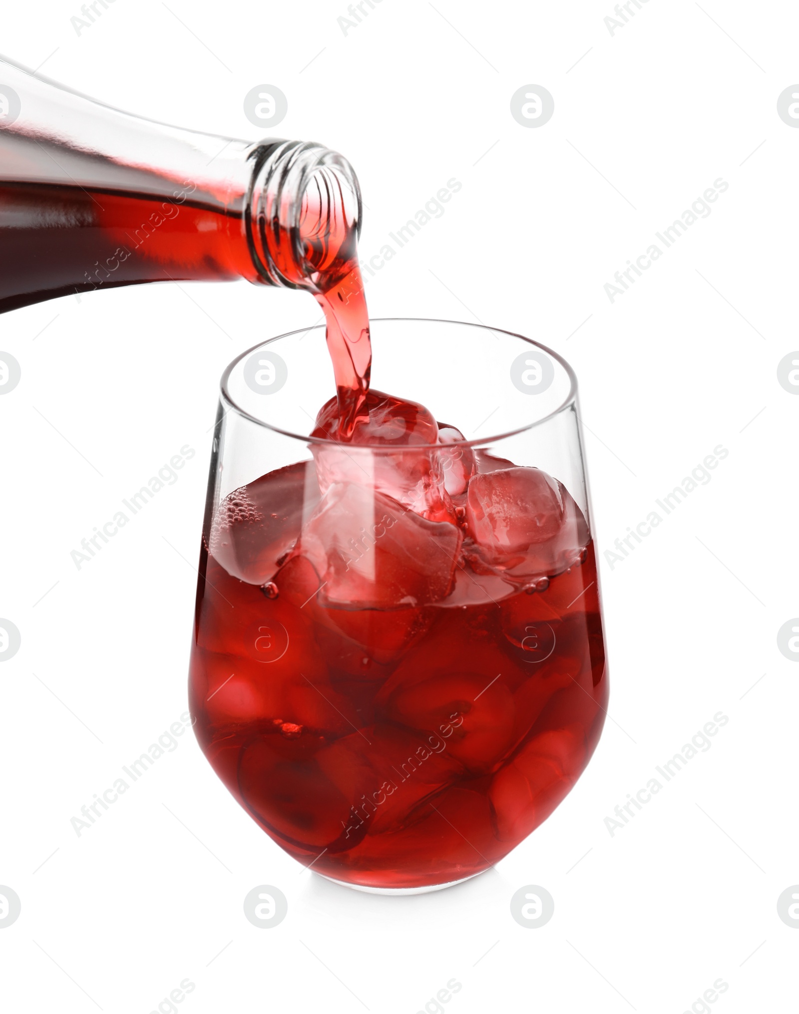 Photo of Pouring grape soda water into glass on white background, closeup. Refreshing drink