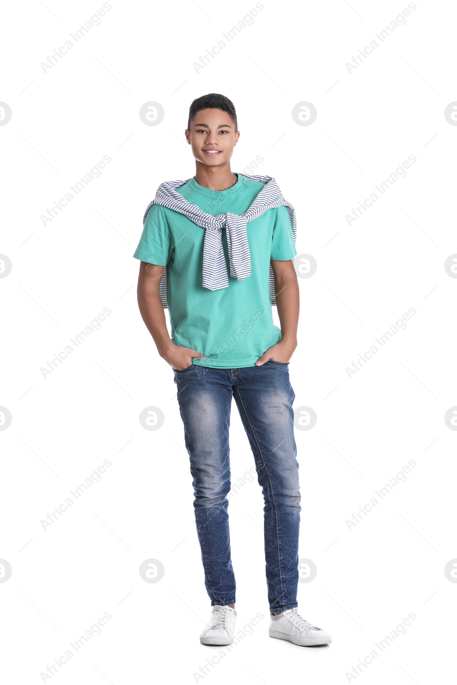 Photo of Portrait of African-American teenage boy on white background