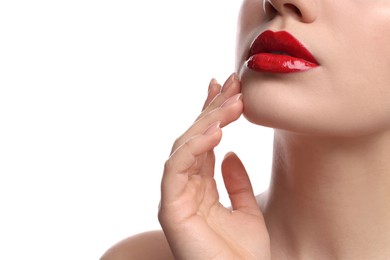 Photo of Closeup view of woman with beautiful full lips on white background