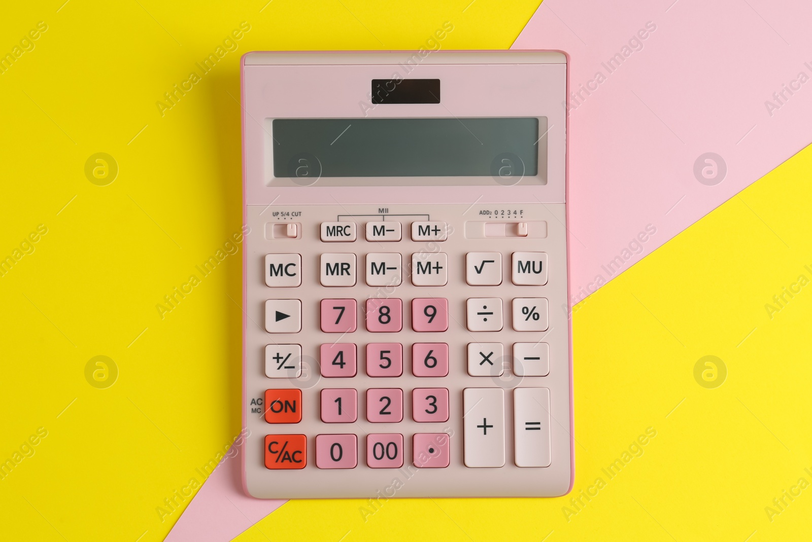 Photo of Modern calculator on color background, top view