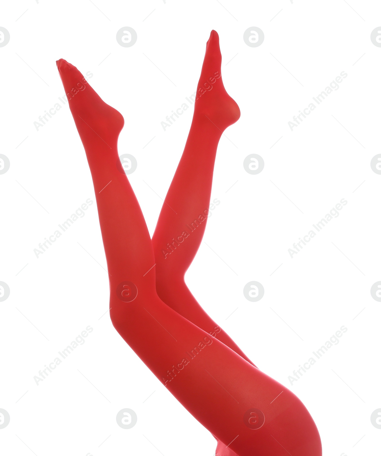 Photo of Woman wearing red tights on white background, closeup of legs