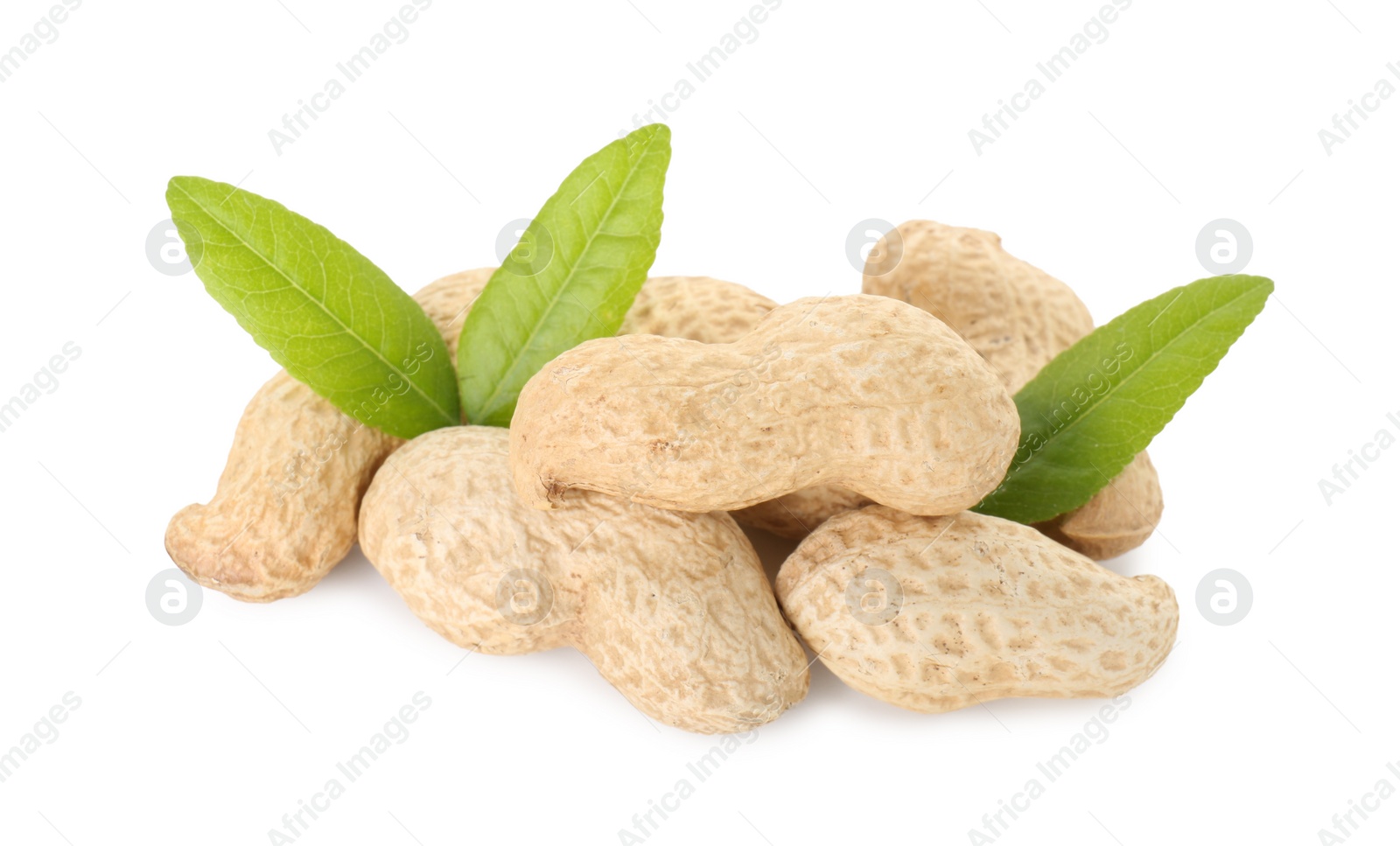 Photo of Fresh unpeeled peanuts and green leaves isolated on white