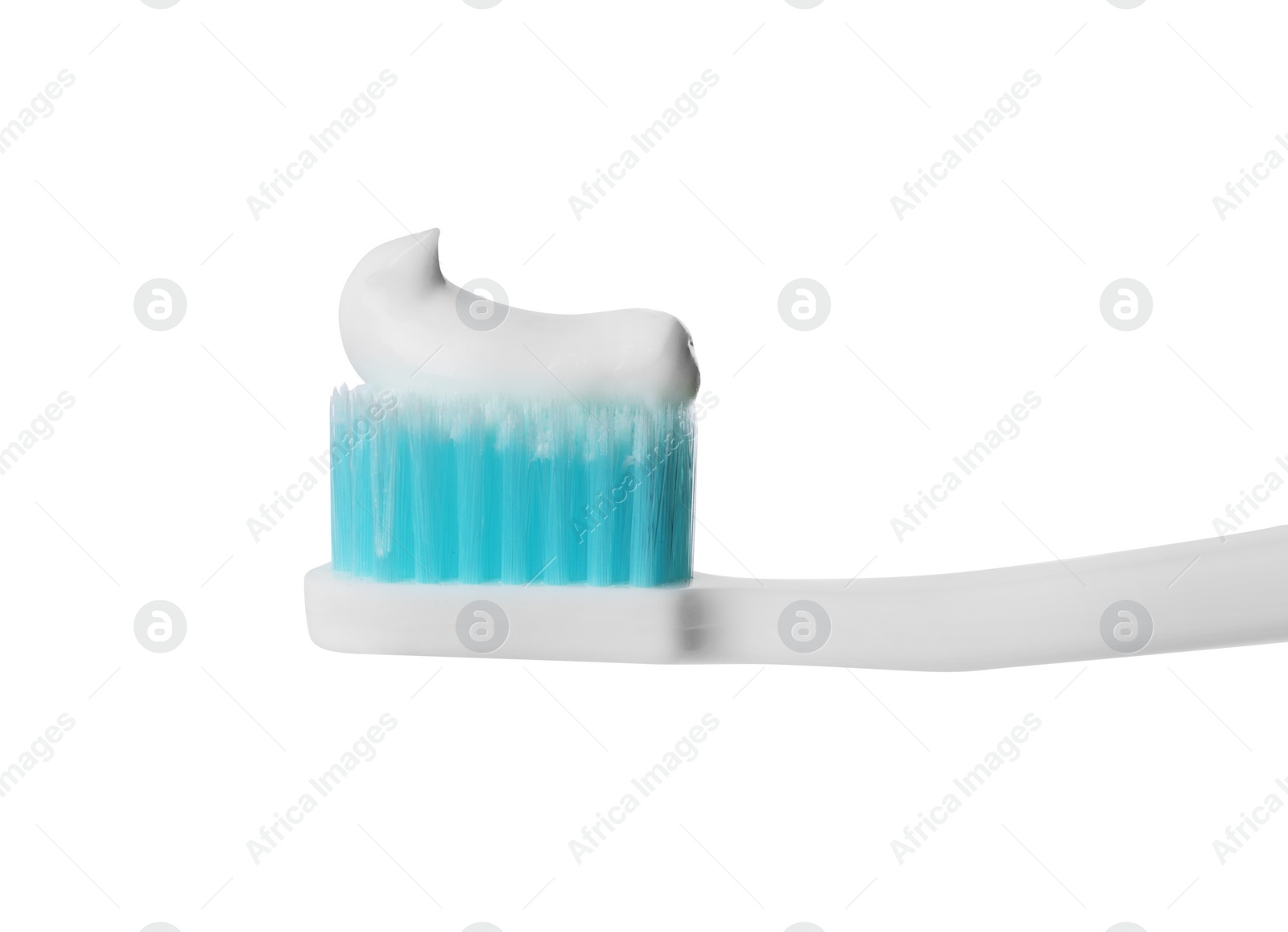 Photo of Plastic toothbrush with paste on white background, closeup