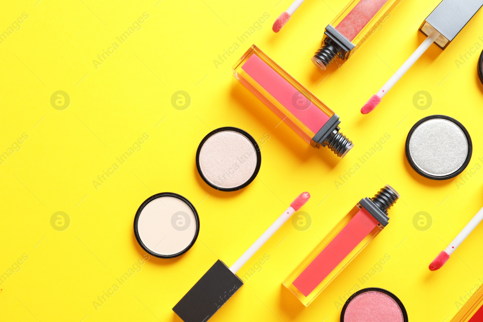 Photo of Composition with lipsticks on color background, flat lay