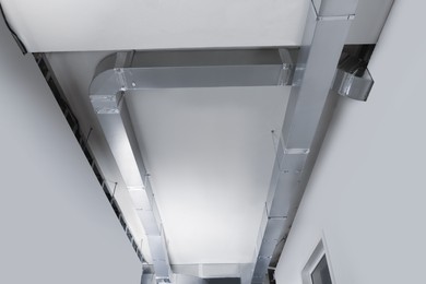 Photo of Ceiling with ventilation system indoors, bottom view