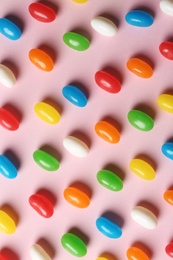 Photo of Bright jelly candies on color background, flat lay