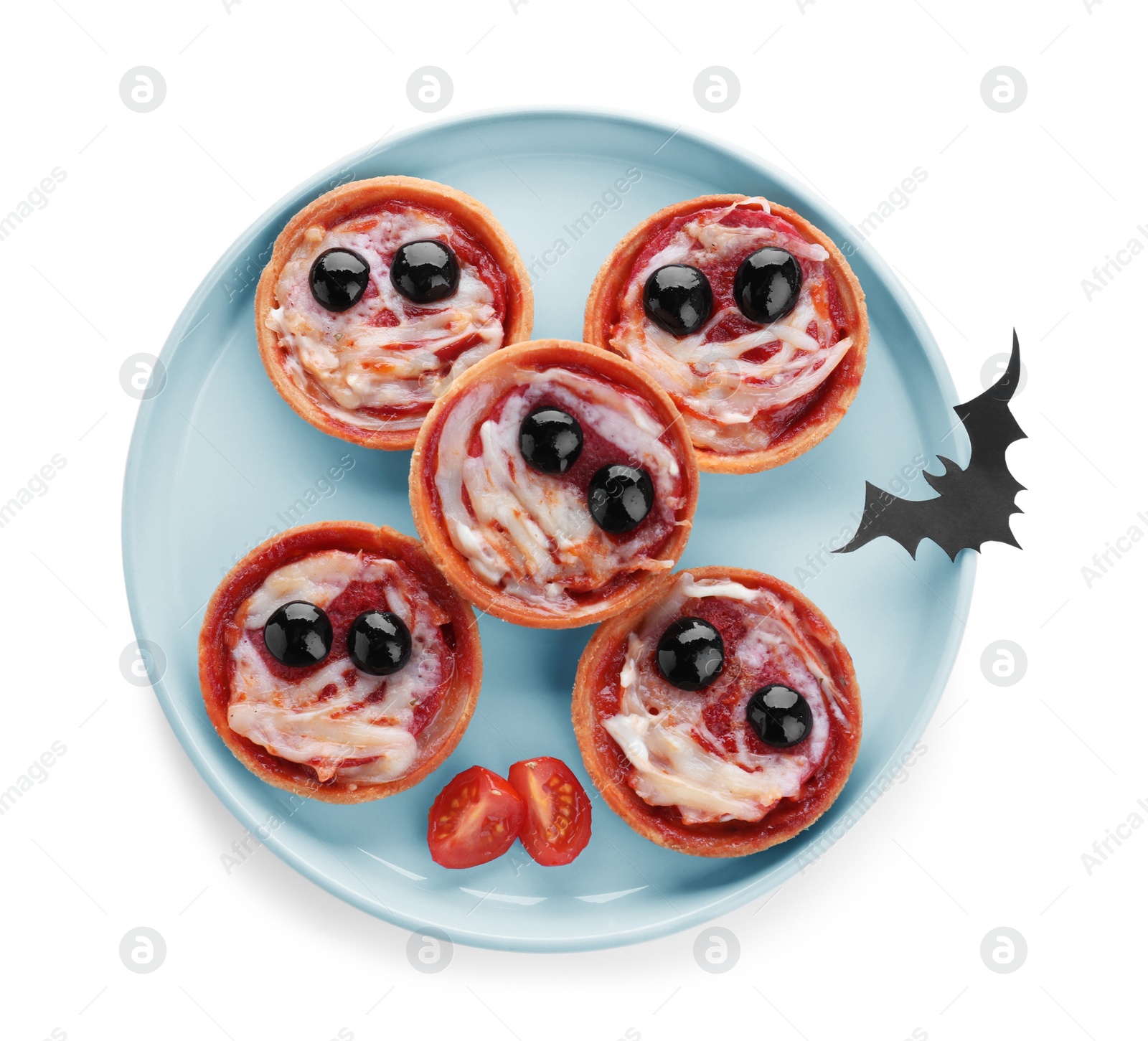 Photo of Cute monster tartlets on white background, top view. Halloween party food